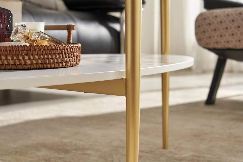 Shrine Oval Coffee Table, Mid-Century Modern Design, 2-Tier Structure, Clear Glass Top and White MDF Shelf, 47" D x 21" W x 17" H, Sleek Conical Metal Legs with Gold Finish