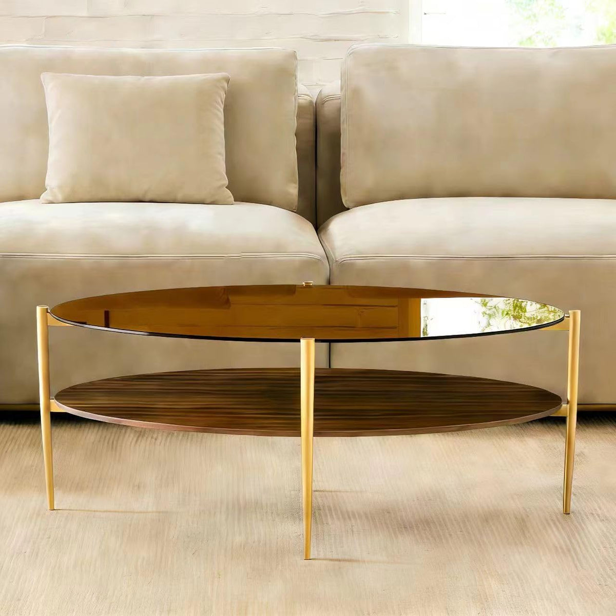 Shrine Oval Coffee Table, Mid-Century Modern Design, 2-Tier Structure, Clear Glass Top and White MDF Shelf, 47" D x 21" W x 17" H, Sleek Conical Metal Legs with Gold Finish