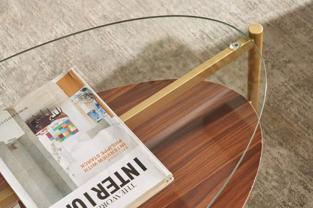 Shrine Oval Coffee Table, Mid-Century Modern Design, 2-Tier Structure, Clear Glass Top and White MDF Shelf, 47" D x 21" W x 17" H, Sleek Conical Metal Legs with Gold Finish