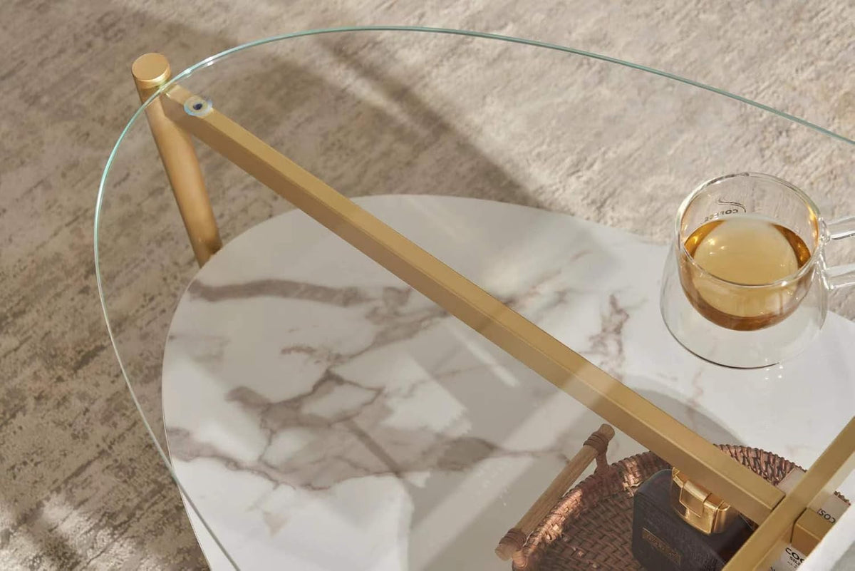 Shrine Oval Coffee Table, Mid-Century Modern Design, 2-Tier Structure, Clear Glass Top and White MDF Shelf, 47" D x 21" W x 17" H, Sleek Conical Metal Legs with Gold Finish