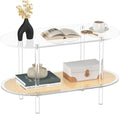 HMYHUM Acrylic Oval Coffee Table, 2-Tier Clear Table with Rattan Storage Shelf, Modern Centre Table for Living Room, Bedroom, Office, Reception Room, 31.5" L Ã 15.7" W Ã 17.7" H