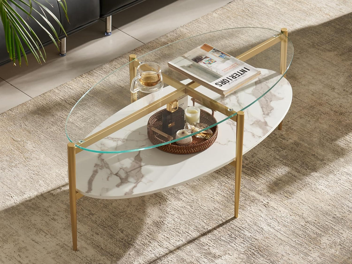 Shrine Oval Coffee Table, Mid-Century Modern Design, 2-Tier Structure, Clear Glass Top and White MDF Shelf, 47" D x 21" W x 17" H, Sleek Conical Metal Legs with Gold Finish